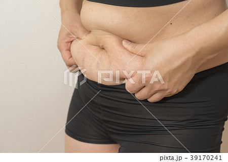 slim athletic woman torso abs belly wearing sportswear. slimming
