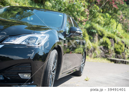 車 黒 黒光り 高級車の写真素材
