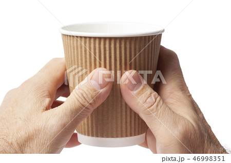 コーヒー 持つ カップ 両手の写真素材