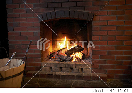 薪ストーブ 北海道 レンガ 暖炉の写真素材