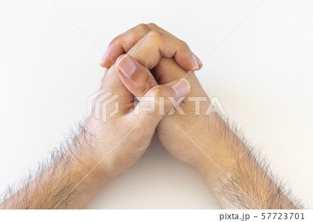 祈る 両手 組む 手の写真素材