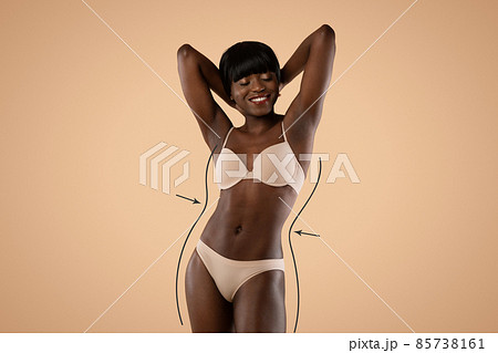 African american woman in underwear demonstrating her perfect body