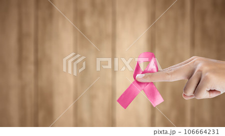 a pregnant woman and a man topless in pajama Pants in the kitchen